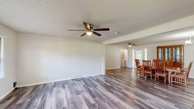 505 Massee Dr, Dothan, AL 36301 - dining area with wood finished floors, a ceiling fan, a chandelier, and crown molding