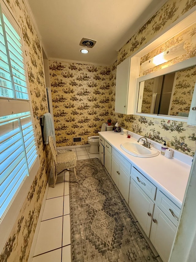 1617 Choctaw St, Dothan, AL 36303 - bathroom with wallpapered walls, vanity, and tile patterned flooring
