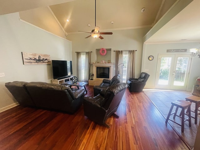 211 Paul Revere Run, Dothan, AL 36305 - living area featuring dark wood finished floors, crown molding, a ceiling fan, french doors, and a glass covered fireplace