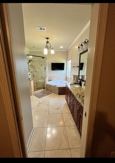 211 Paul Revere Run, Dothan, AL 36305 - bathroom featuring ornamental molding, a shower stall, a garden tub, tile patterned floors, and vanity
