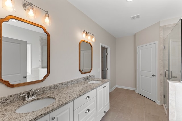 bathroom with vanity and walk in shower