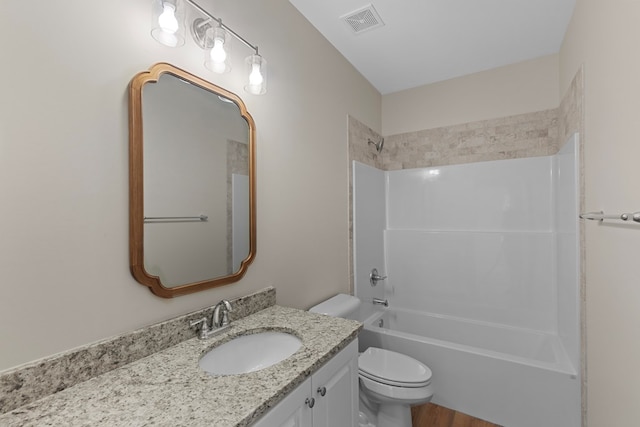 full bathroom featuring vanity, shower / bathing tub combination, wood-type flooring, and toilet