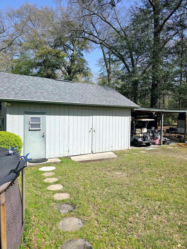 653 Honeysuckle Hills Rd, Ozark, AL 36360 - view of outdoor structure featuring a carport