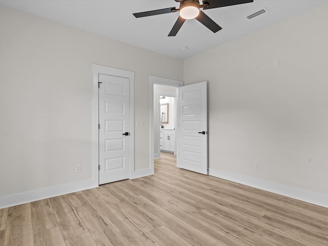 146 County Road 657, Chancellor, AL 36316 - unfurnished bedroom with light wood-style flooring and a ceiling fan