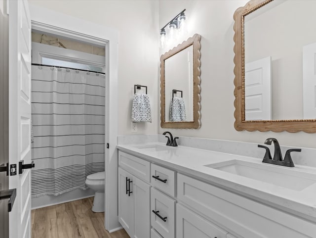 146 County Road 657, Chancellor, AL 36316 - full bath with double vanity and wood finished floors