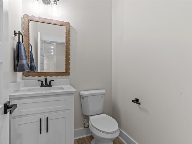 146 County Road 657, Chancellor, AL 36316 - bathroom featuring vanity and wood finished floors