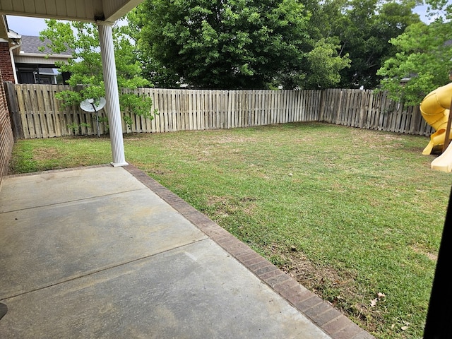 view of yard featuring a fenced backyard and a patio area