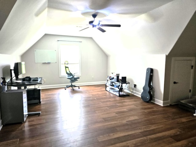 additional living space featuring baseboards, ceiling fan, wood finished floors, and vaulted ceiling