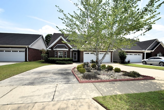 view of front of house featuring brick siding, driveway, a front lawn, and a garage