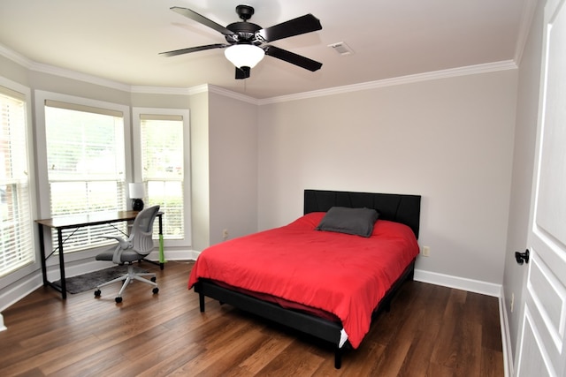 bedroom featuring crown molding, baseboards, ceiling fan, and wood finished floors