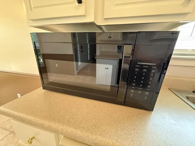 291 Nomad Cir, Kinsey, AL 36303 - kitchen view of white cabinetry