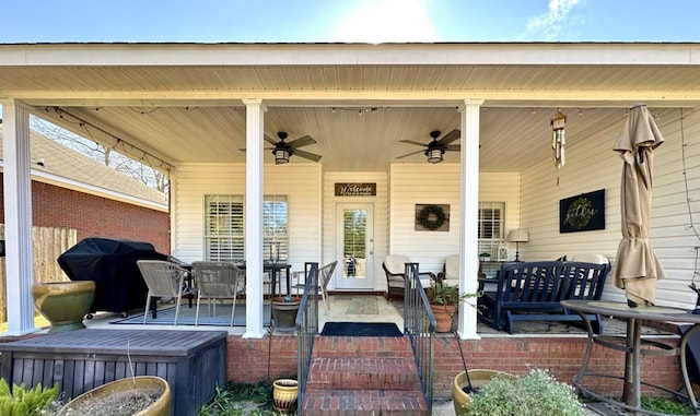 view of patio / terrace with area for grilling and ceiling fan