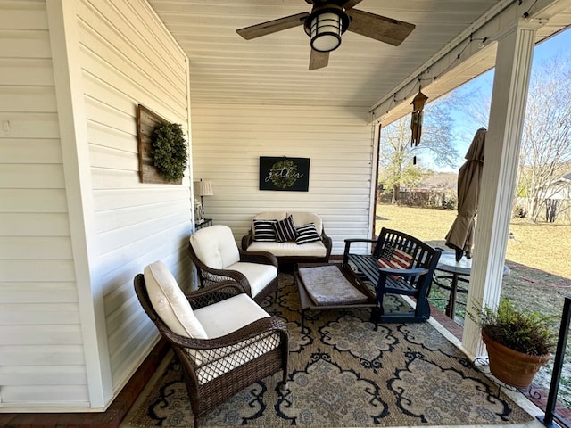 view of patio / terrace with an outdoor living space and ceiling fan