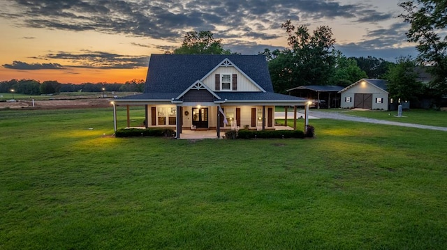 208 Reardon, Rehobeth, AL 36301 - back of property with a yard, covered porch, and dirt driveway