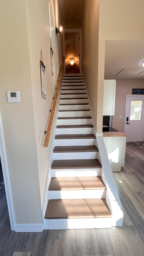 208 Reardon, Rehobeth, AL 36301 - stairs with wood finished floors and baseboards
