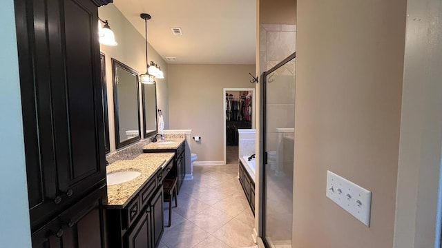 208 Reardon, Rehobeth, AL 36301 - full bath featuring double vanity, toilet, a tile shower, tile patterned floors, and a tub