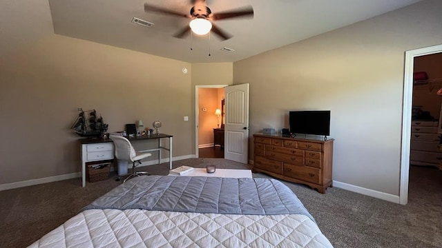 208 Reardon, Rehobeth, AL 36301 - bedroom featuring carpet floors, a walk in closet, a desk, and baseboards