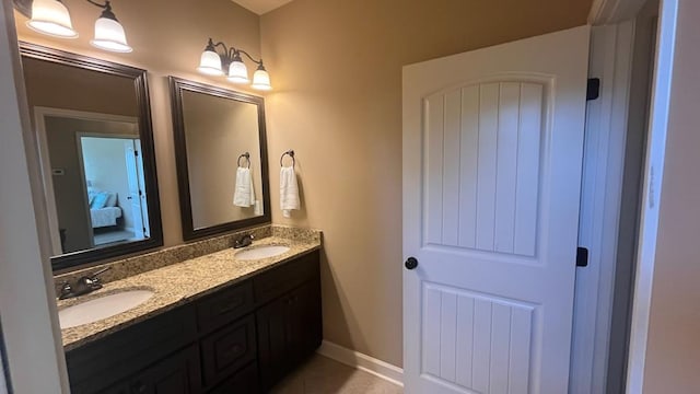 208 Reardon, Rehobeth, AL 36301 - full bath with double vanity, tile patterned floors, and baseboards