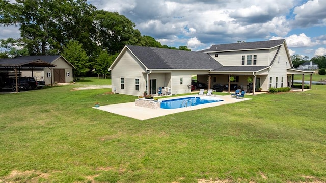 208 Reardon, Rehobeth, AL 36301 - back of property with a patio, a yard, an outdoor pool, and roof with shingles