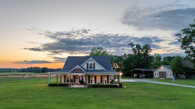208 Reardon, Rehobeth, AL 36301 - view of front of home featuring covered porch, a carport, gravel driveway, and a front lawn