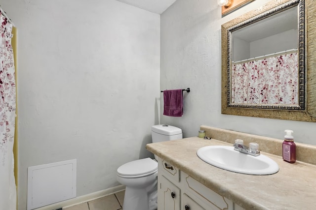 full bath with toilet, tile patterned flooring, and vanity