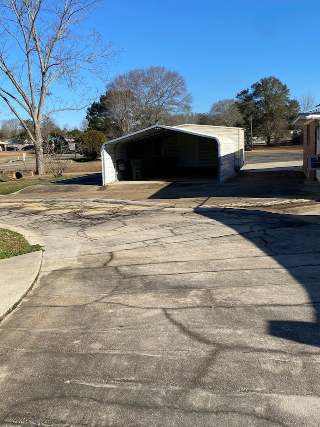 exterior space featuring a carport