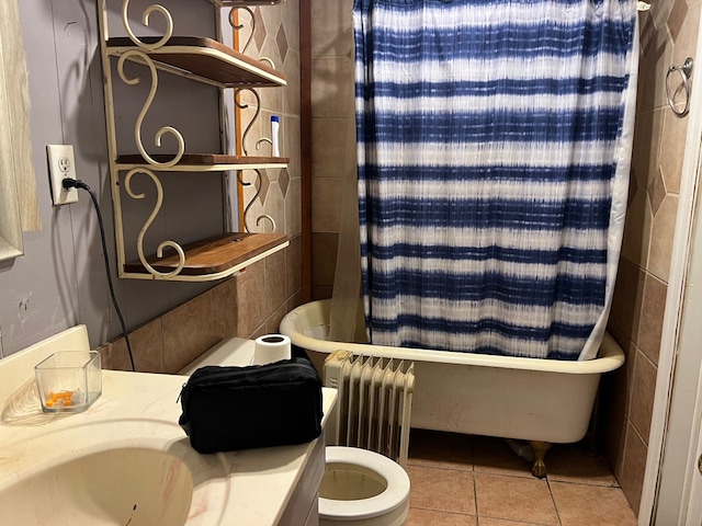 50 Holanna Rd, Morris, GA 39867 - bathroom with radiator, tile patterned floors, toilet, and shower / bath combo with shower curtain
