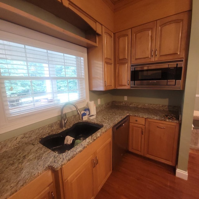 6325 State Highway 95, Abbeville, AL 36310 - kitchen with dishwasher, stainless steel microwave, wood finished floors, light stone counters, and crown molding