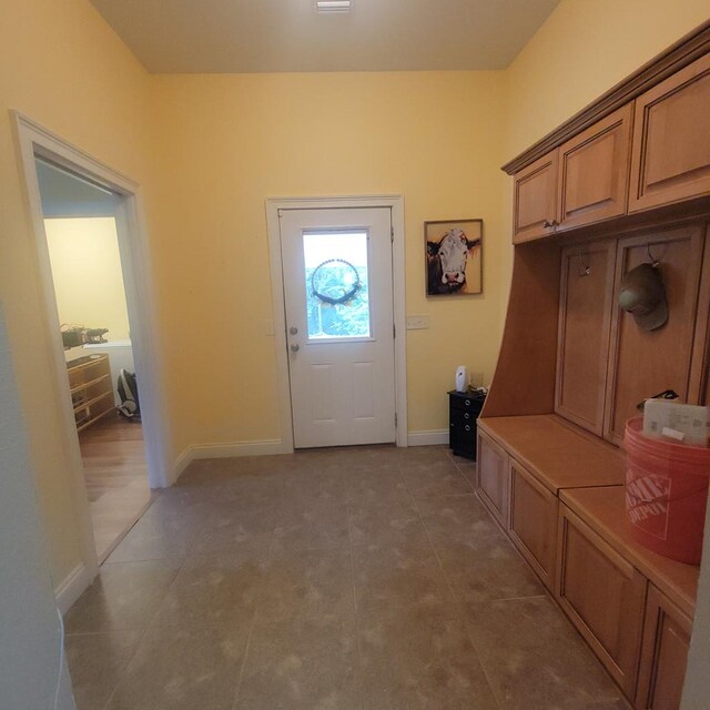 6325 State Highway 95, Abbeville, AL 36310 - mudroom featuring baseboards and tile patterned flooring