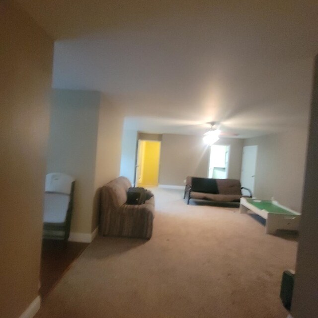 6325 State Highway 95, Abbeville, AL 36310 - living area with carpet flooring and a ceiling fan
