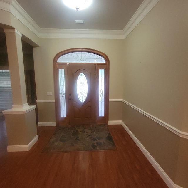 6325 State Highway 95, Abbeville, AL 36310 - foyer with decorative columns, wood finished floors, and ornamental molding