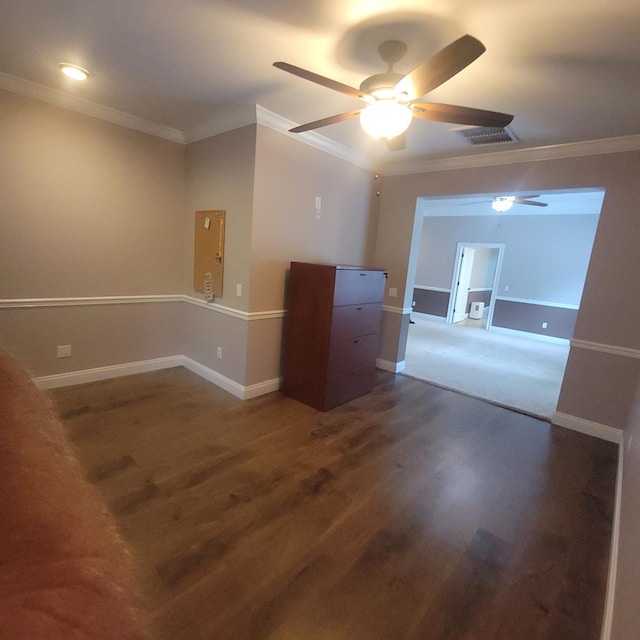 6325 State Highway 95, Abbeville, AL 36310 - spare room with a ceiling fan, crown molding, and dark wood-style flooring