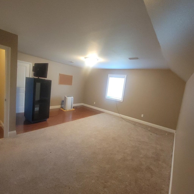 6325 State Highway 95, Abbeville, AL 36310 - additional living space with carpet floors and vaulted ceiling
