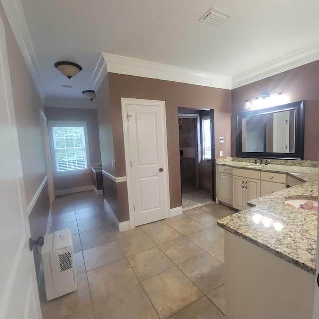 6325 State Highway 95, Abbeville, AL 36310 - bathroom with ornamental molding, vanity, plenty of natural light, and tile patterned flooring