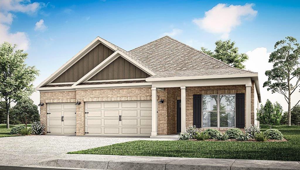305 Heritage Way, Headland, AL 36345 - view of front of house featuring a garage, concrete driveway, roof with shingles, board and batten siding, and brick siding