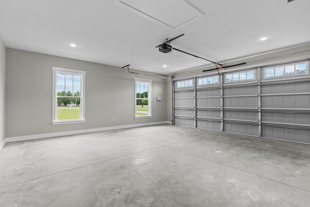 45 County Road 711, Enterprise, AL 36330 - garage featuring a garage door opener, baseboards, and recessed lighting