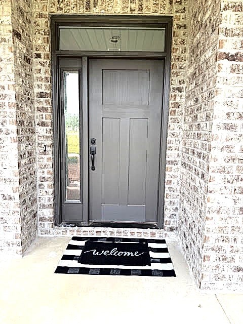 45 County Road 711, Enterprise, AL 36330 - doorway to property featuring brick siding