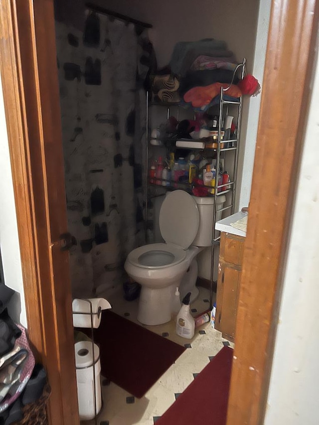 bathroom with vanity and toilet