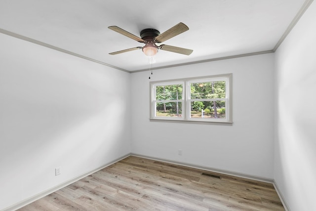 1571 Denton Rd, Dothan, AL 36303 - empty room featuring ornamental molding, light wood-style floors, and a ceiling fan