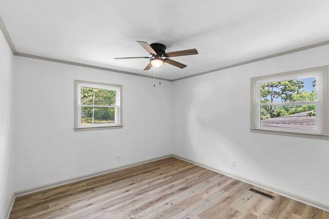 1571 Denton Rd, Dothan, AL 36303 - empty room with crown molding, light wood-style flooring, and ceiling fan