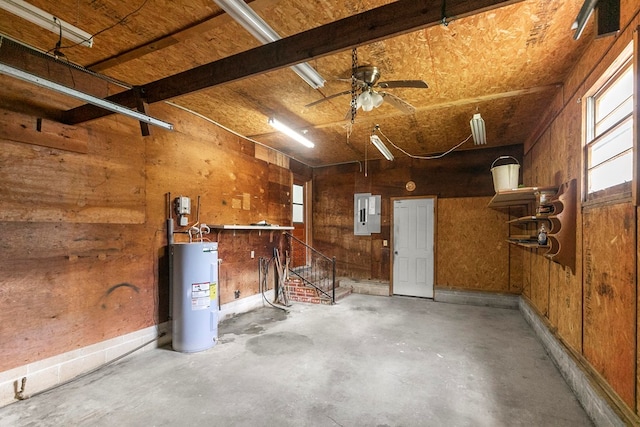 1571 Denton Rd, Dothan, AL 36303 - garage with water heater, wood walls, electric panel, and a ceiling fan
