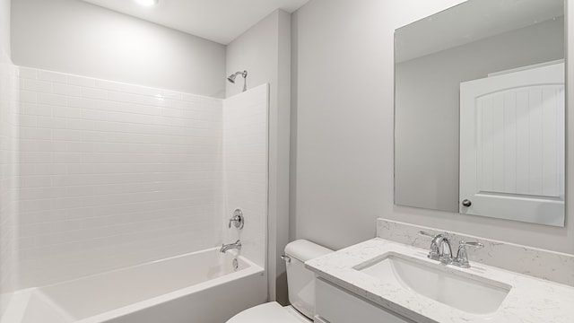 bathroom with toilet, vanity, and bathing tub / shower combination