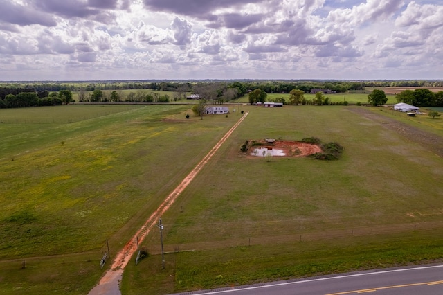 birds eye view of property featuring a rural view