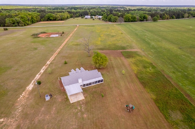 bird's eye view with a rural view and a wooded view