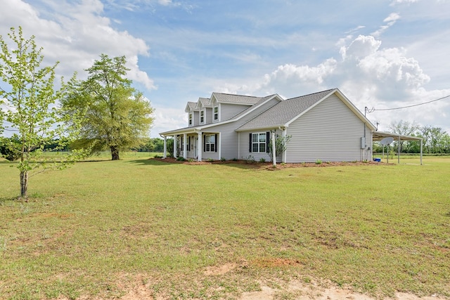 view of home's exterior featuring a carport and a lawn