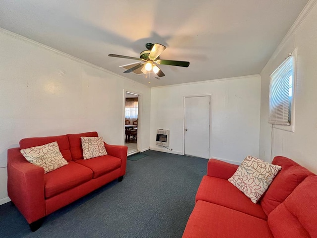 living room featuring heating unit, a ceiling fan, baseboards, ornamental molding, and carpet flooring