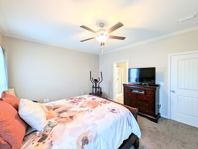 bedroom with visible vents, crown molding, and carpet floors