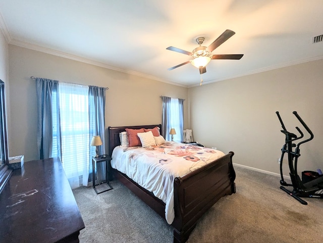 bedroom with ceiling fan, crown molding, multiple windows, and carpet flooring