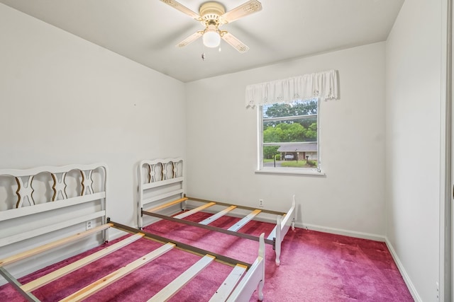702 Highland St, Dothan, AL 36301 - carpeted bedroom with baseboards and a ceiling fan