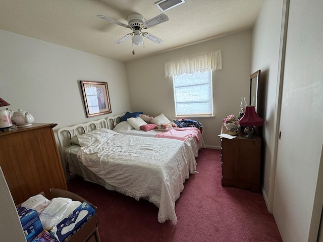 bedroom featuring carpet floors, a ceiling fan, and baseboards